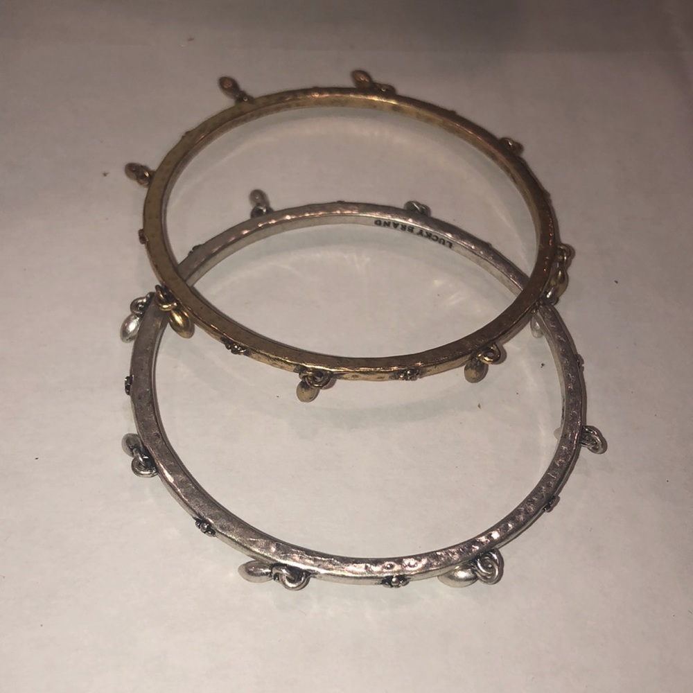 Set of 2 Bracelets with little charm hang offs